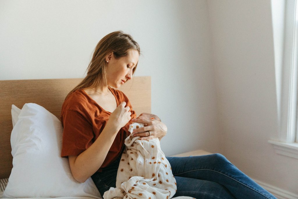 Newborn breastfeeding photography in Boston